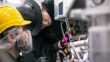 workers building victus haze satellite rocket lab